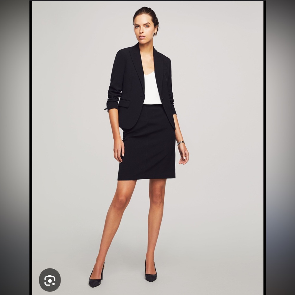 Holt Renfrew black skirt suit with subtle metallic thread single button